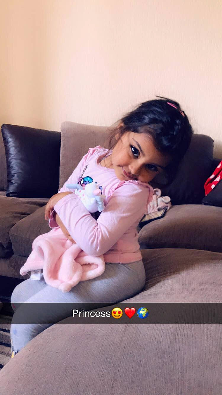 Ayesha is registered to the contest to win money with this photo: baby, black_hair, child, comfort, couch, daughter, joy, leg, person, photography, sitting, sportswear, thigh, toddler, yoga_pant