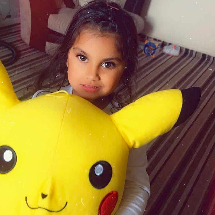 Ayesha joined the competition — help win amazing prizes! black_hair, brown_hair, child, ear, eye, finger, fun, head, long_hair, neck, nose, person, photography, plush, skin, smile, snapshot, stuffed_toy, textile, toy