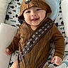 David joined the competition — help win amazing prizes! baby, blanket, cap, clothing, face, happy, hat, head, hood, hoodie, knitwear, person, photography, portrait, skin, sleeve, smile, sweater, sweatshirt, tattoo
