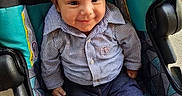 Emiliano joined the competition — help win amazing prizes! baby, baby_boy, baby_girl, blue_pants, casual, child, clothing, cute, footwear, happy, indoors, infant, person, portrait, seat, seated, smiling, striped_shirt, stroller, white_shoes