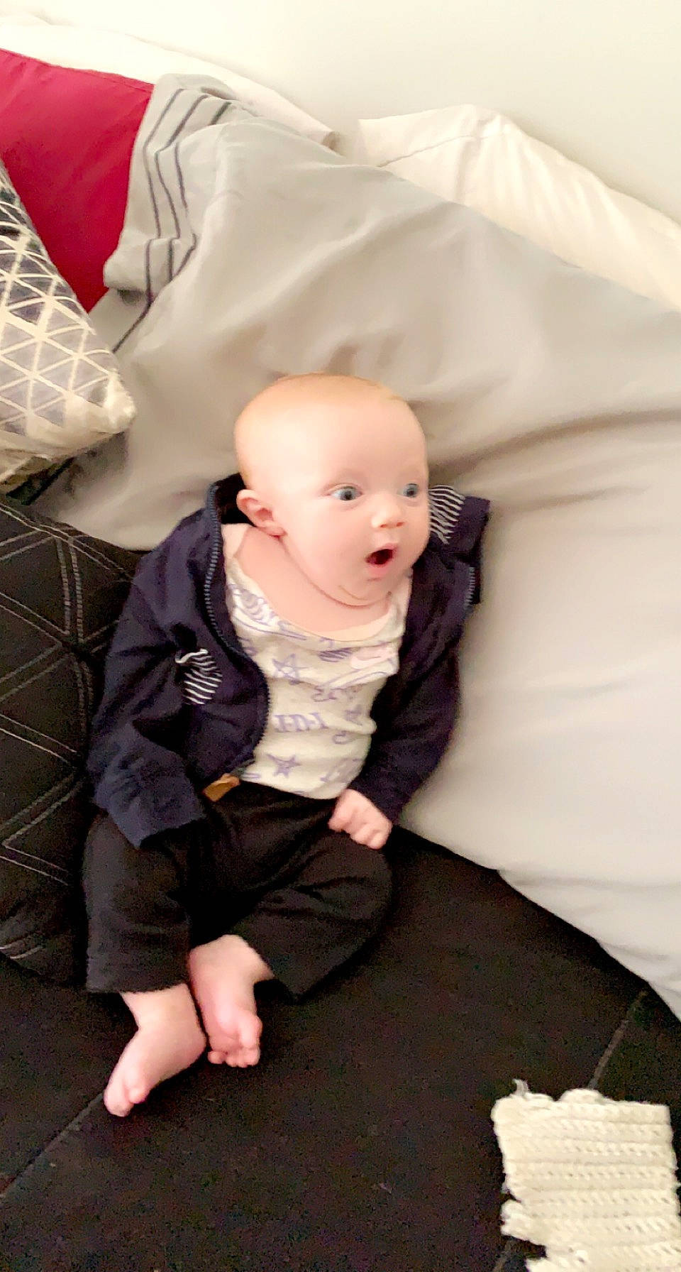 Cassandra joined the competition — help win amazing prizes! baby, baby_products, baby_toddler_clothing, cheek, child, comfort, eye, flash_photography, flooring, foot, formal_wear, fur, happy, linens, person, room, sitting, skin, sleeve, smile