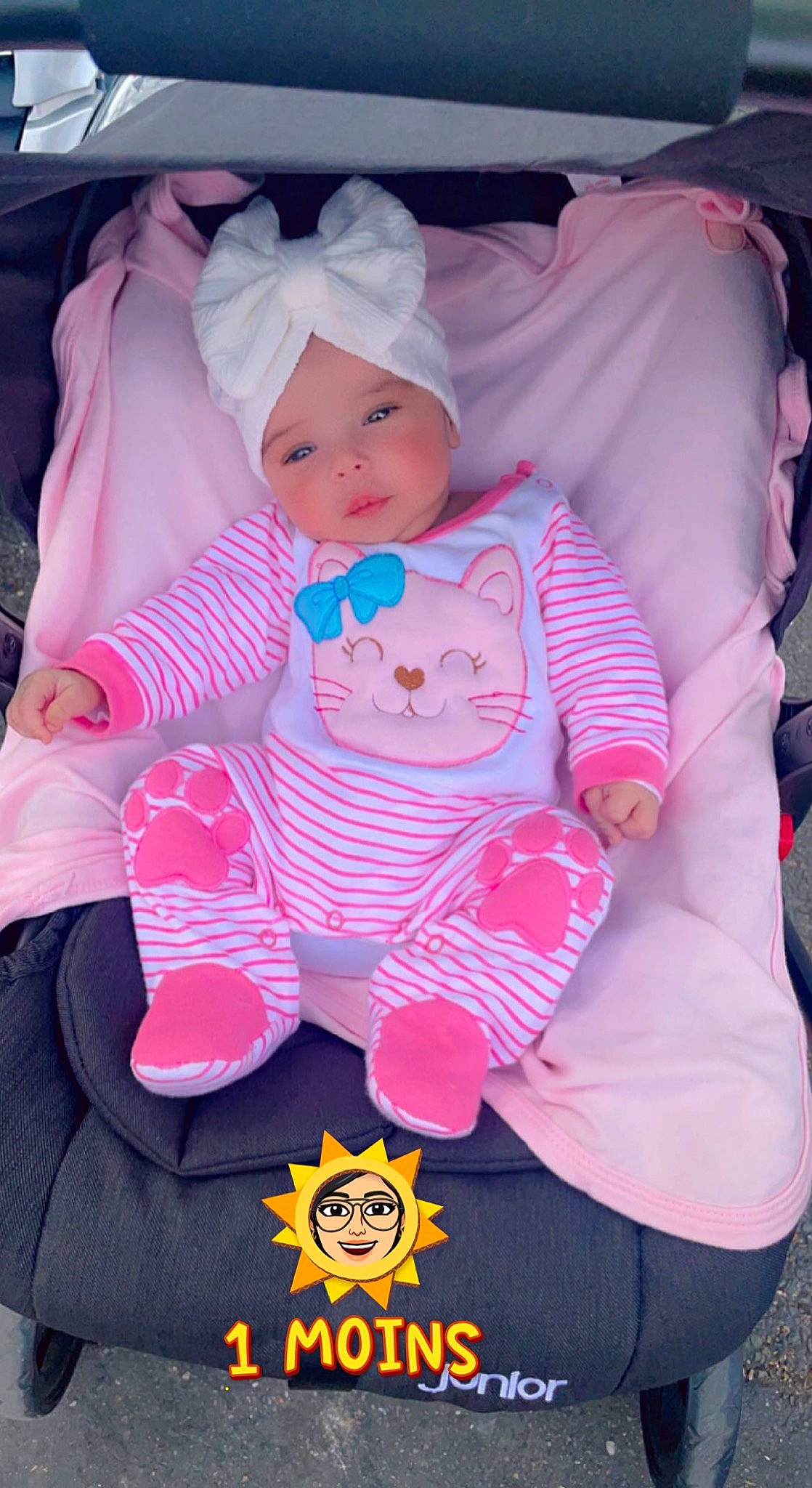 Iliana participe au concours pour gagner de l'argent avec cette photo : baby, baby_carriage, baby_products, baby_toddler_clothing, cheek, child, comfort, facial_expression, headgear, headwear, lap, magenta, person, pink, product, purple, sitting, skin, sleeve, textile