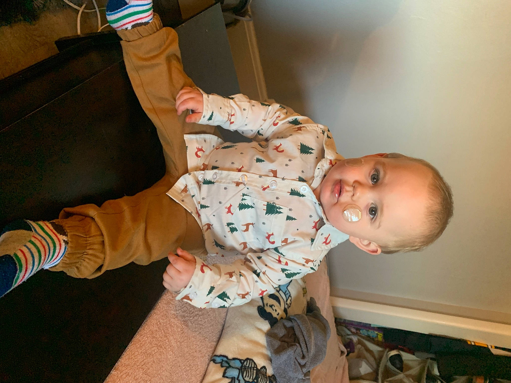 Eli joined the competition — help win amazing prizes! baby, baby_toddler_clothing, comfort, elbow, flooring, fun, happy, human_leg, joint, knee, leg, pattern, person, sitting, skin, smile, sock, thigh, toddler, wood