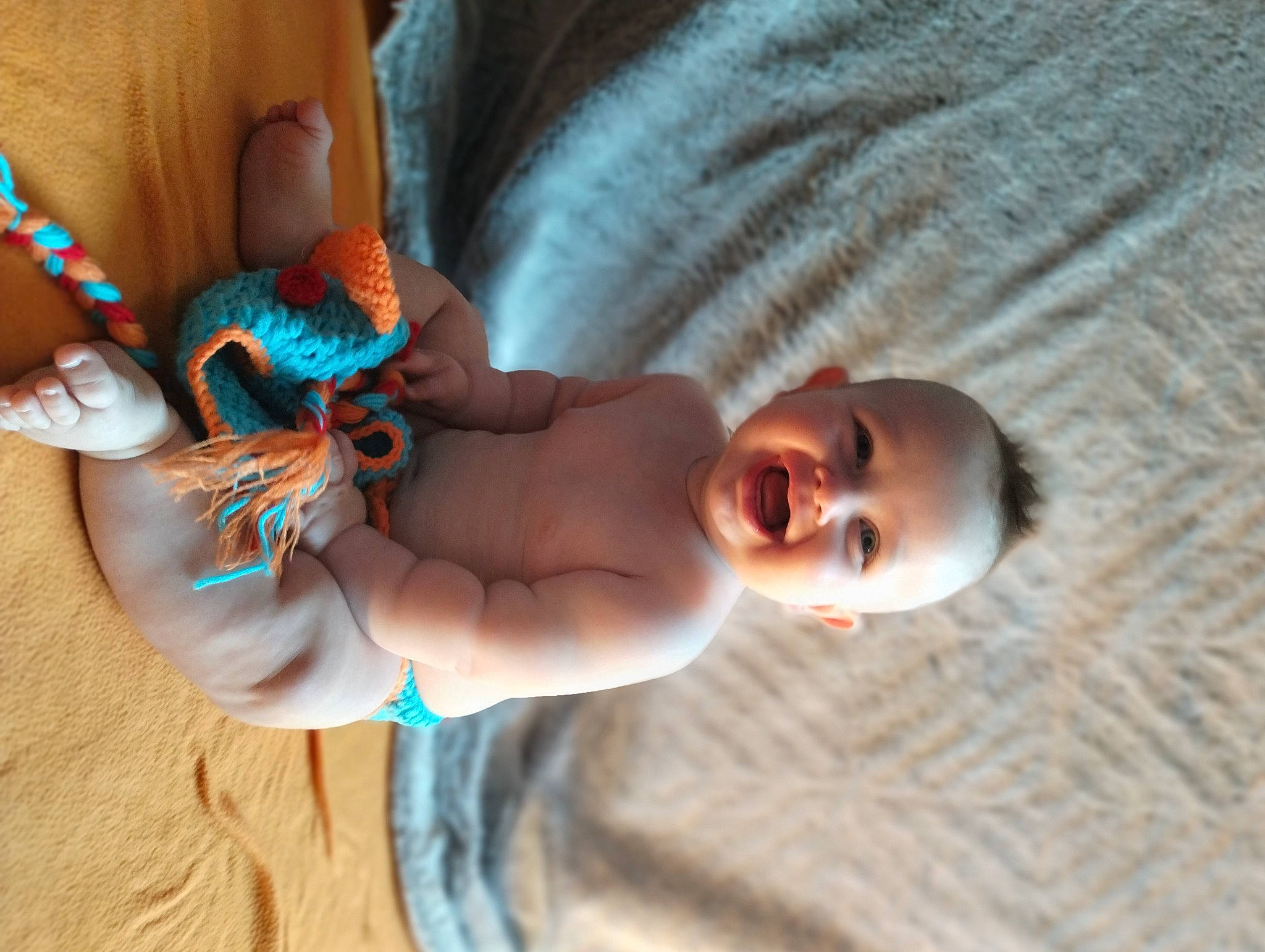 Ryker is registered to the contest to win money with this photo: baby, baby_toddler_clothing, child, face, finger, happy, joint, joy, mammal, nail, neck, organism, person, skin, smile, textile, thumb, toddler, toy, vertebrate