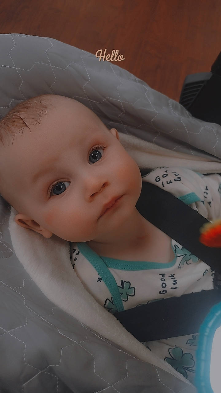 Erikson is registered to the contest to win money with this photo: baby, baby_products, baby_toddler_clothing, cap, cheek, child, eye, eyebrow, eyelash, fashion_accessory, flash_photography, fun, happy, iris, lip, nose, person, skin, sleeve, smile