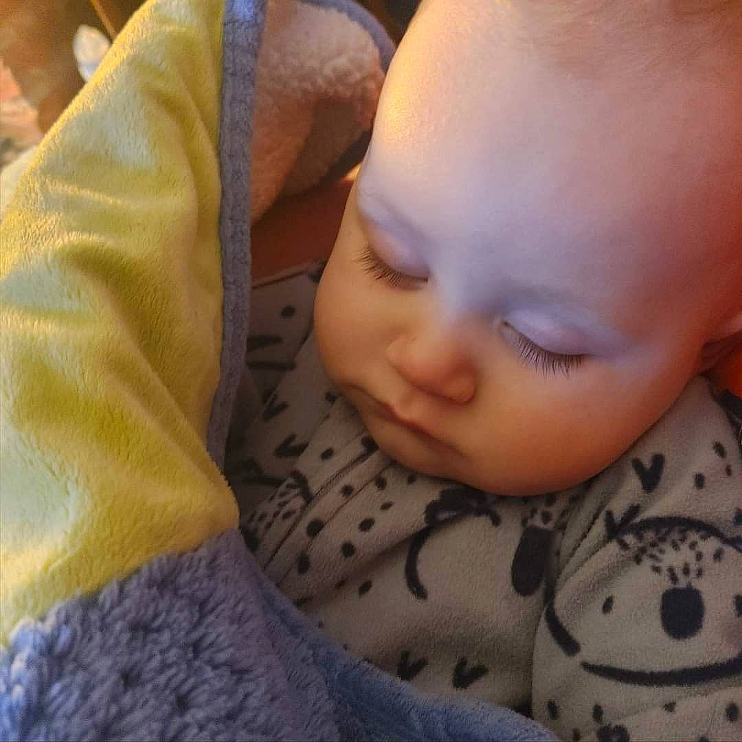 Erikson is registered to the contest to win money with this photo: baby, baby_sleeping, baby_toddler_clothing, bedtime, cheek, child, comfort, eyebrow, eyelash, grass, happy, iris, linens, mouth, nap, nose, person, skin, sleep, sleeve