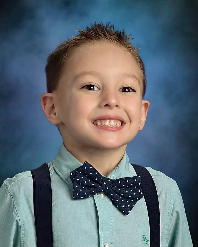 Loki is registered to the contest to win money with this photo: bow_tie, chin, collar, dress_shirt, eye, eyebrow, face, facial_expression, flash_photography, gesture, hair, happy, joy, lip, neck, nose, organ, outerwear, person, sleeve