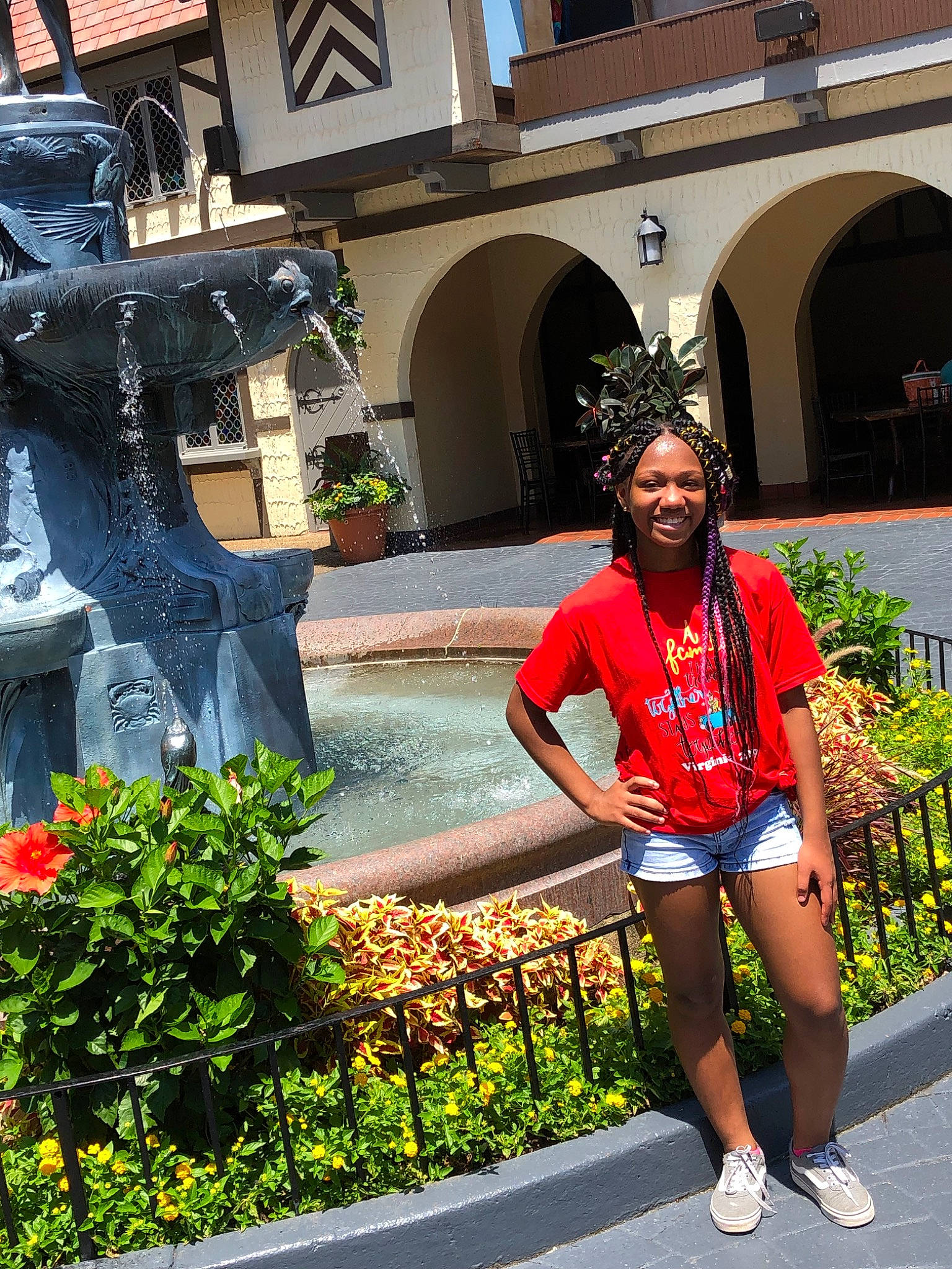 Tanaisha is registered to the contest to win money with this photo: architecture, beauty, footwear, human_leg, joy, leaf, leg, leisure, pedestrian, person, plant, recreation, red, snapshot, street, summer, thigh, tourism, travel, tree