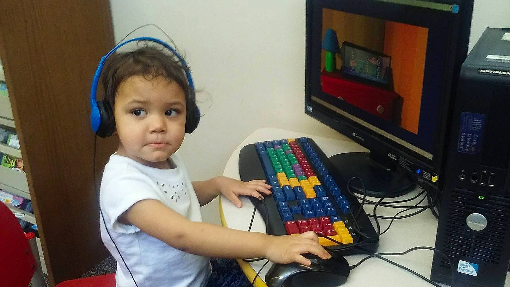 Bethanny is registered to the contest to win money with this photo: audio_equipment, computer, computer_desk, computer_hardware, computer_keyboard, computer_monitor, desk, desktop_computer, engineering, gadget, input_device, mouse, office_equipment, output_device, peripheral, person, personal_computer, space_bar, table, toddler