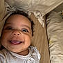 baby, babylaughing, bed, bedroom, clothing, couch, cushion, face, furniture, happy, head, homedecor, indoors, laughing, person, photography, portrait, room, smile, t_shirt
