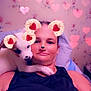 Bella Ann Garrett joined the competition — help win amazing prizes! person, puppy, dog, face_filter, bear_ears, nose_filter, heart_overlay, pink_hearts, floral_wallpaper, indoor, bed, pillow, black_tank_top, cute, pet, resting, closeup, digital_effect, affection, portrait