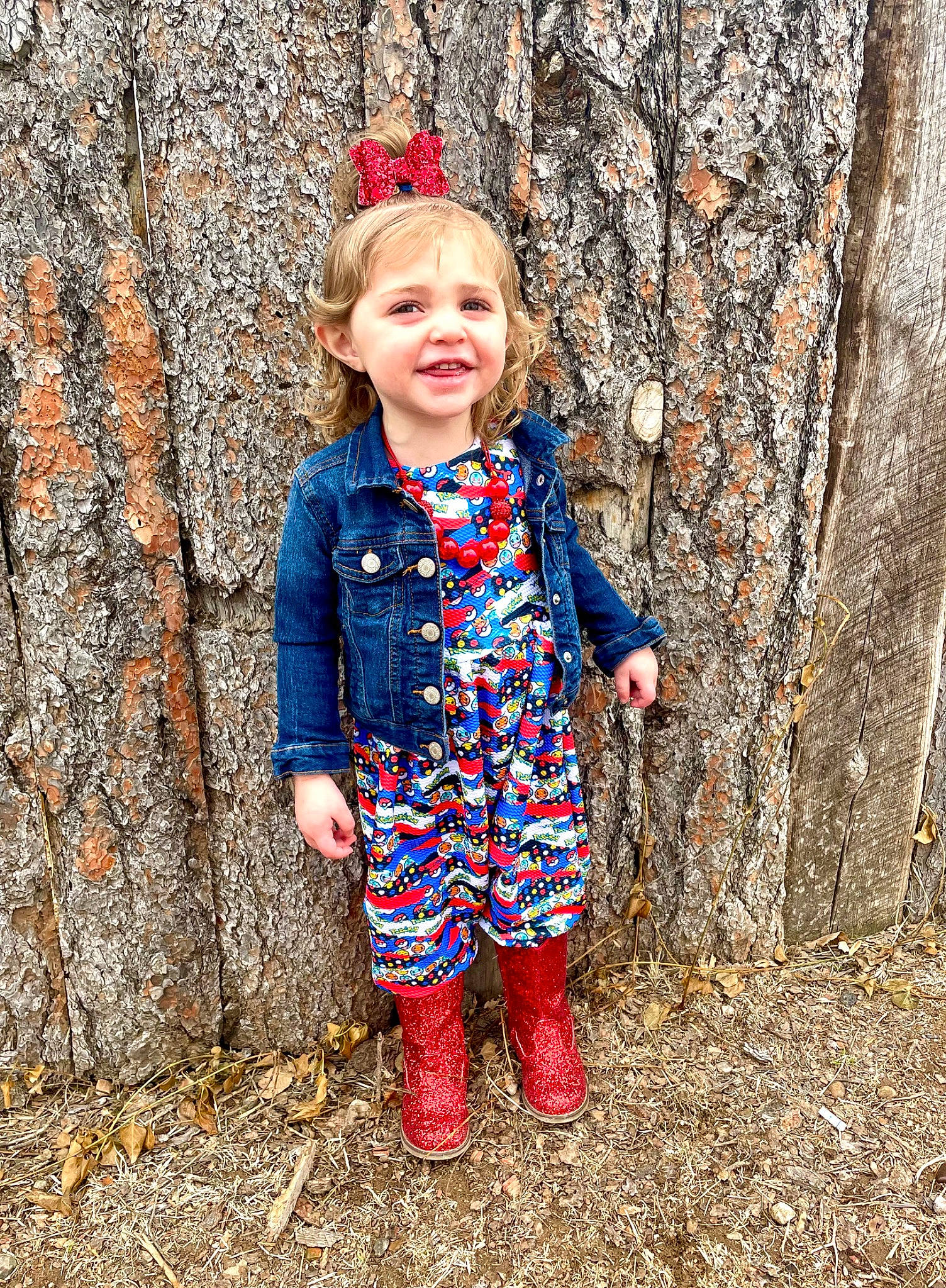 Emma joined the competition — help win amazing prizes! baby_toddler_clothing, child, denim, electric_blue, eye, fun, grass, happy, joy, magenta, outerwear, pattern, people_in_nature, person, sleeve, smile, soil, toddler, tree, trousers
