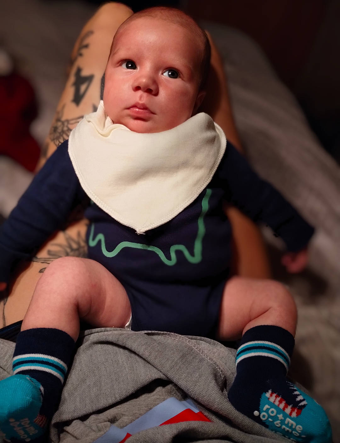 Brody joined the competition — help win amazing prizes! arm, baby, baby_toddler_clothing, child, event, finger, fun, hand, human_body, human_leg, joint, knee, pattern, person, sitting, sleeve, sock, textile, thigh, thumb
