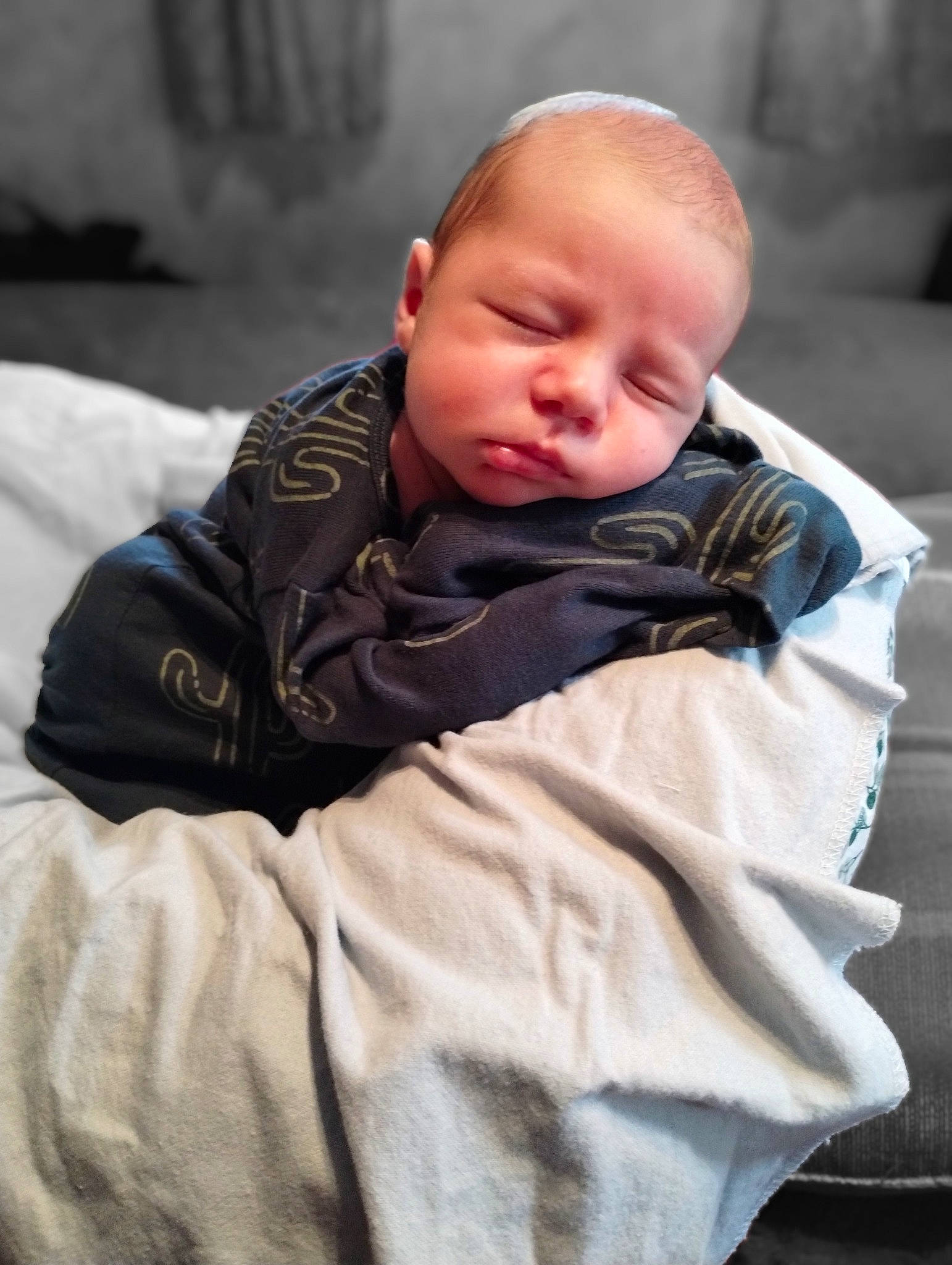 Brody is registered to the contest to win money with this photo: baby, baby_toddler_clothing, cheek, child, comfort, fun, fur, happy, person, portrait_photography, sitting, sleeve, sorrow, toddler, windbreaker, winter