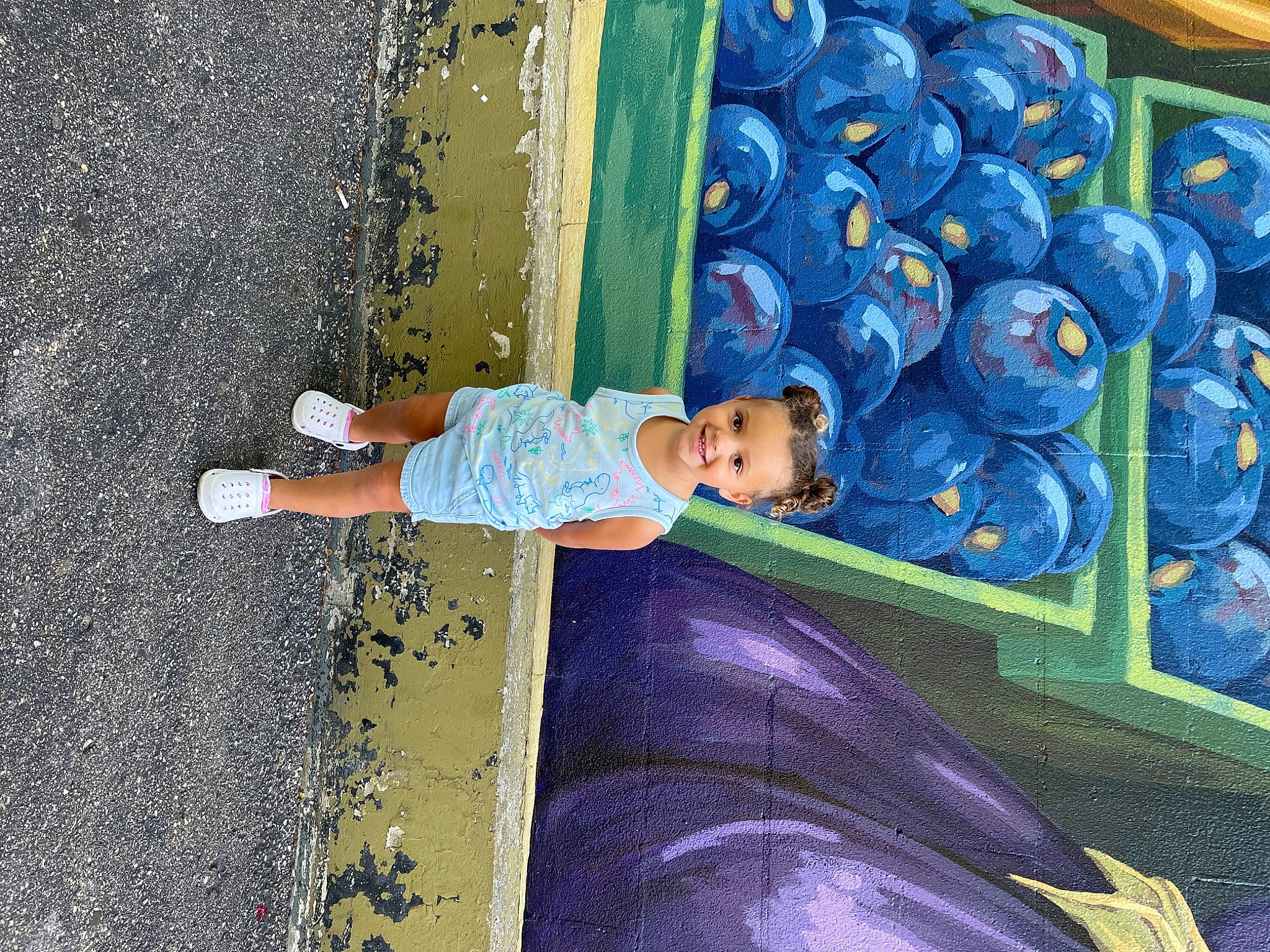 Ellianna is registered to the contest to win money with this photo: art, azure, baby, child, concrete, electric_blue, fun, joy, leisure, paint, painting, pattern, person, play, shadow, sidewalk, tints_and_shades, toddler, visual_arts