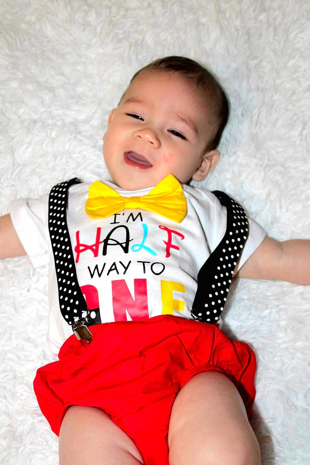 Louis joined the competition — help win amazing prizes! baby_toddler_clothing, clothing, facial_expression, finger, happy, neck, orange, outerwear, person, pink, product, skin, sleeve, smile, standing, stomach, t_shirt, textile, thigh, toddler