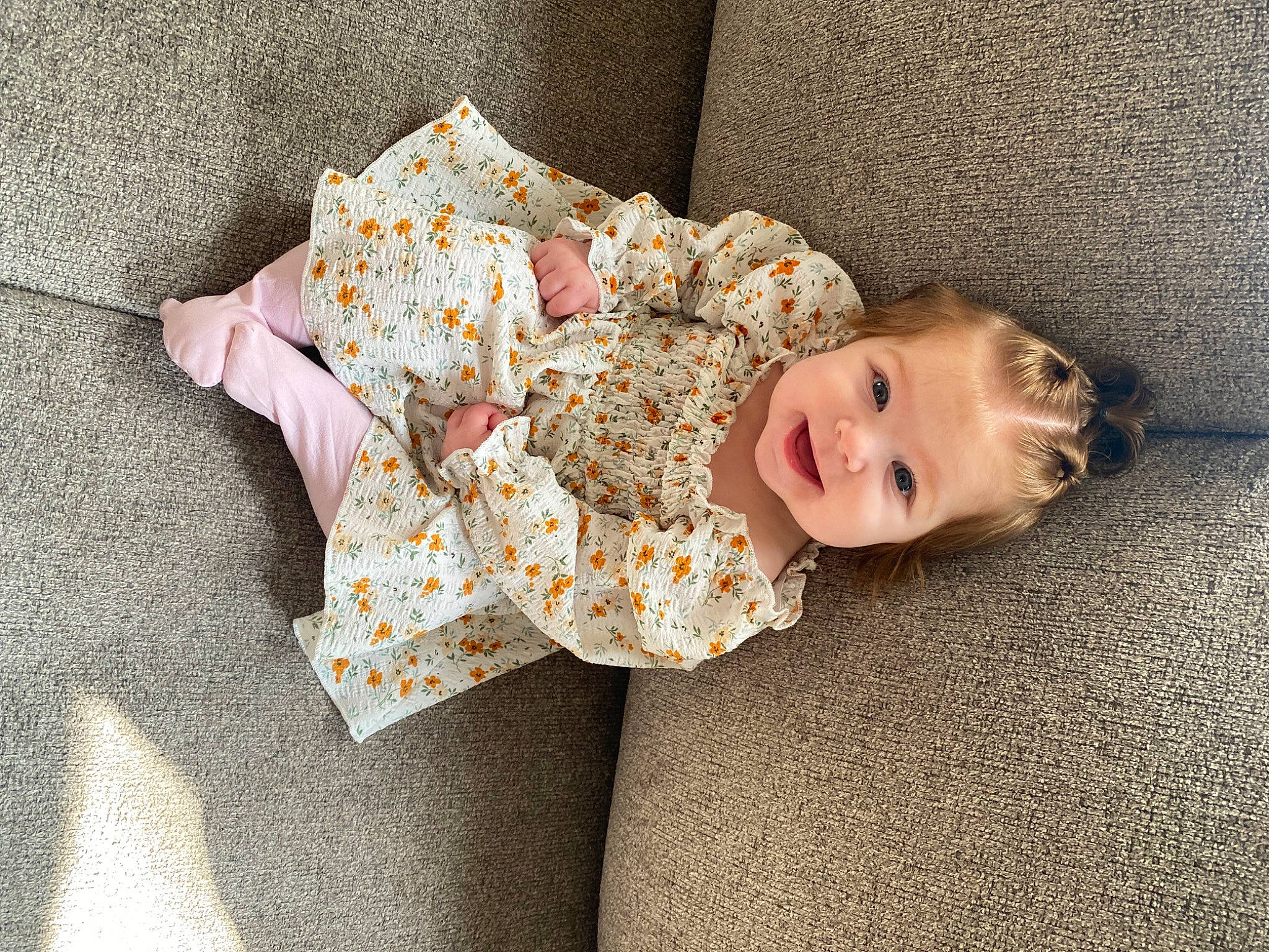 Cecilia joined the competition — help win amazing prizes! baby, baby_toddler_clothing, child, comfort, flooring, happy, linens, pattern, person, room, sitting, sleeve, smile, toddler, wood