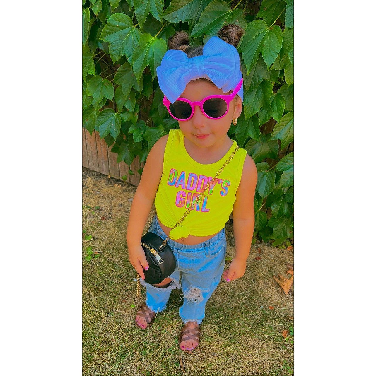 Emma Mae joined the competition — help win amazing prizes! baby_toddler_clothing, clothing, eyewear, glasses, goggles, grass, happy, head, headgear, headwear, jeans, pattern, people_in_nature, person, personal_protective_equipment, plant, shirt, sleeve, sunglasses, t_shirt