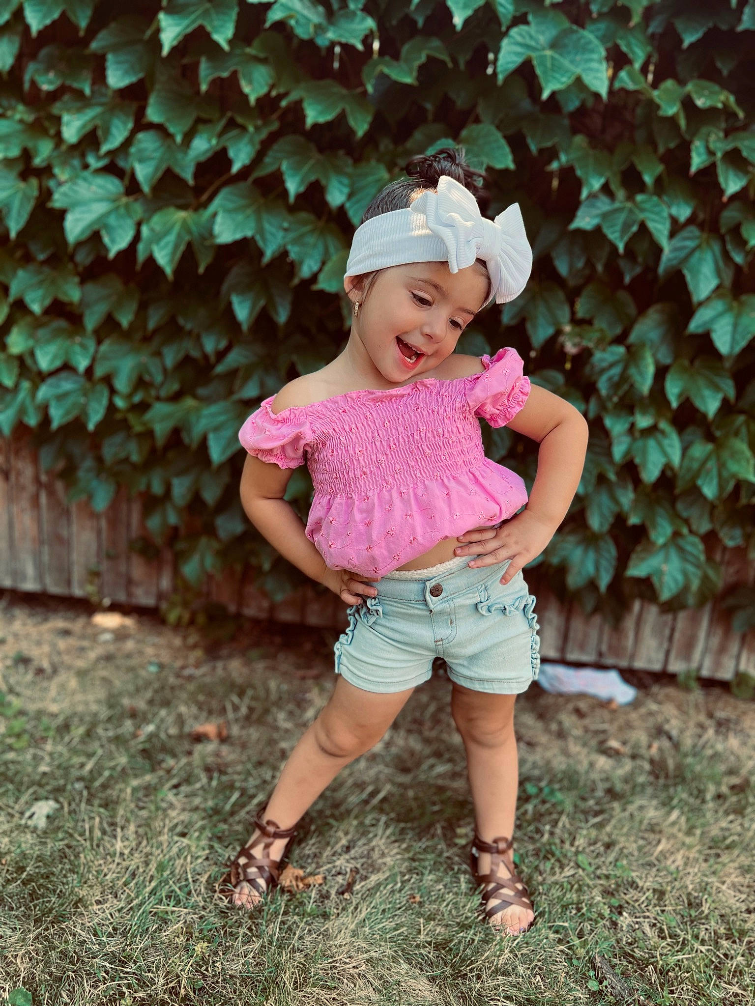 Emma Mae is registered to the contest to win money with this photo: cap, clothing, eye, fruit, glasses, grass, grass_family, happy, hat, headwear, joy, lawn, leaf, leisure, people_in_nature, person, plant, shorts, smile, sun_hat