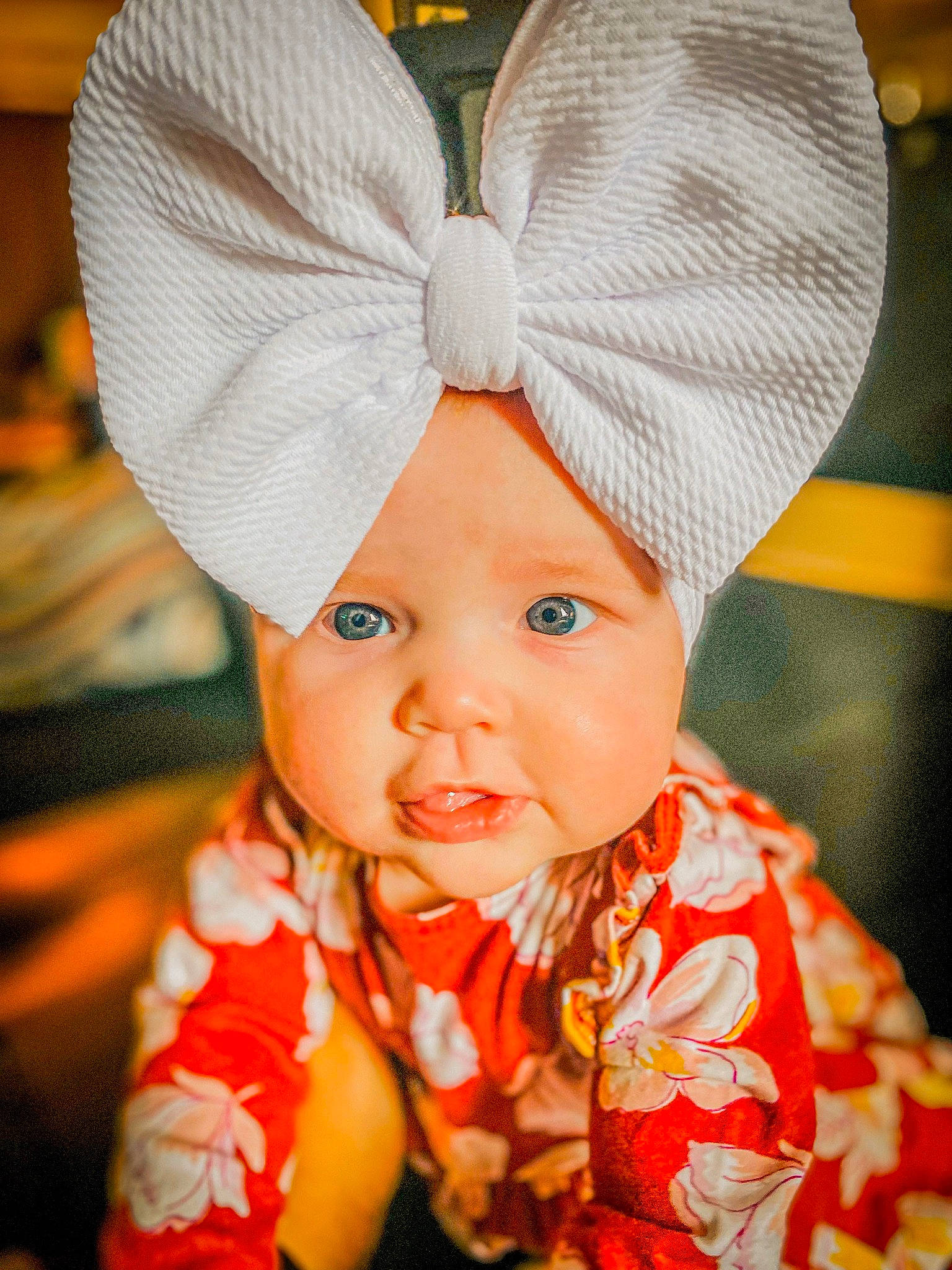 Winter is registered to the contest to win money with this photo: baby, baby_toddler_clothing, cap, child, costume_hat, dress, event, eye, face, fashion_accessory, hair_accessory, happy, hat, head, headwear, human_body, peach, person, sleeve, toddler