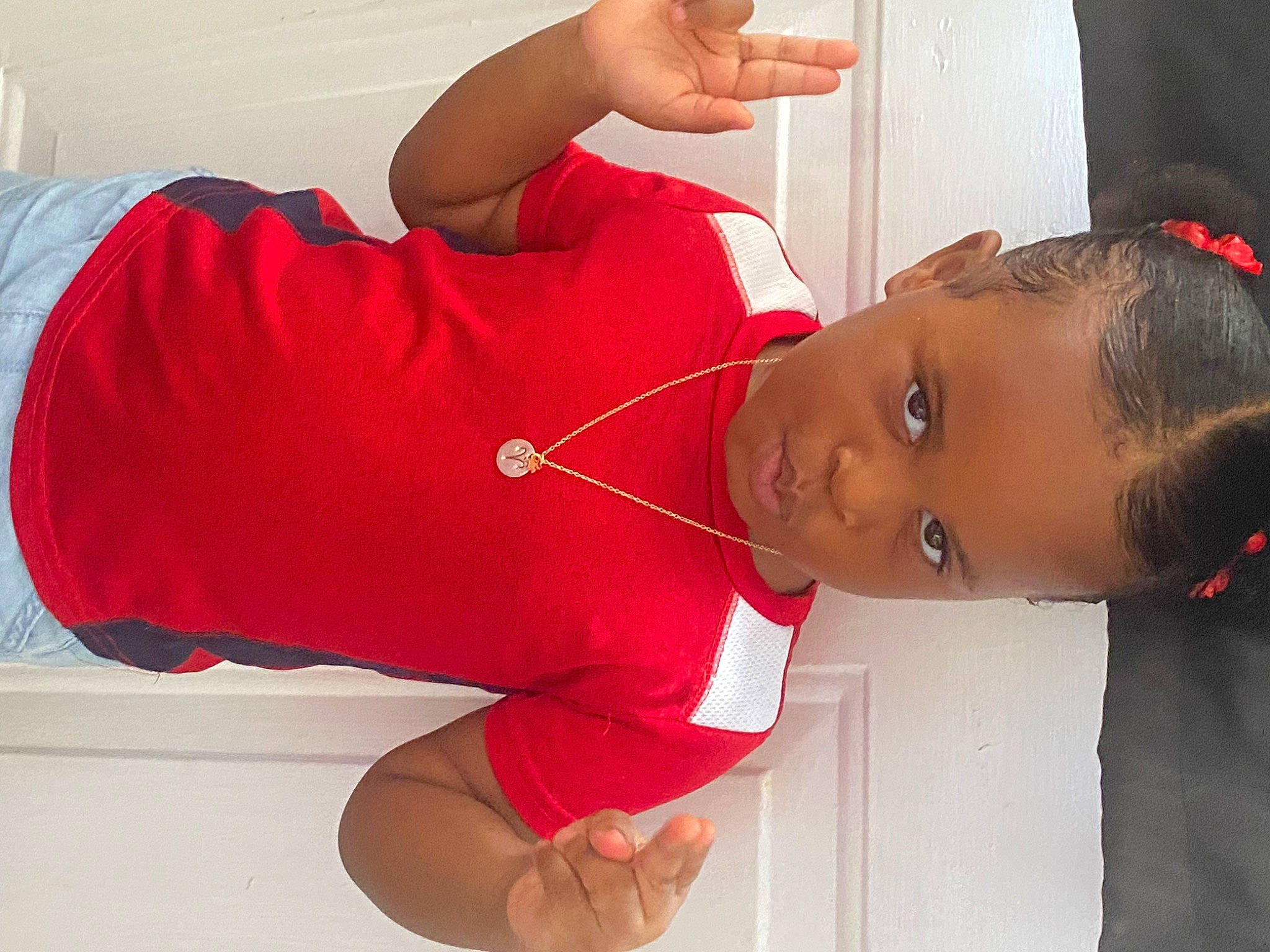 Imani joined the competition — help win amazing prizes! abdomen, arm, carmine, chest, child, comfort, elbow, eyelash, gesture, human_leg, joint, knee, mouth, neck, person, sleeve, thigh, toddler, trunk, water