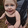 baby, child, infant, smiling, happy, outdoor, forest, nature, baby_carrier, front_carrier, adult, parent, tattoo, face, blue_eyes, blond_hair, portrait, candid, sitting, black_clothing
