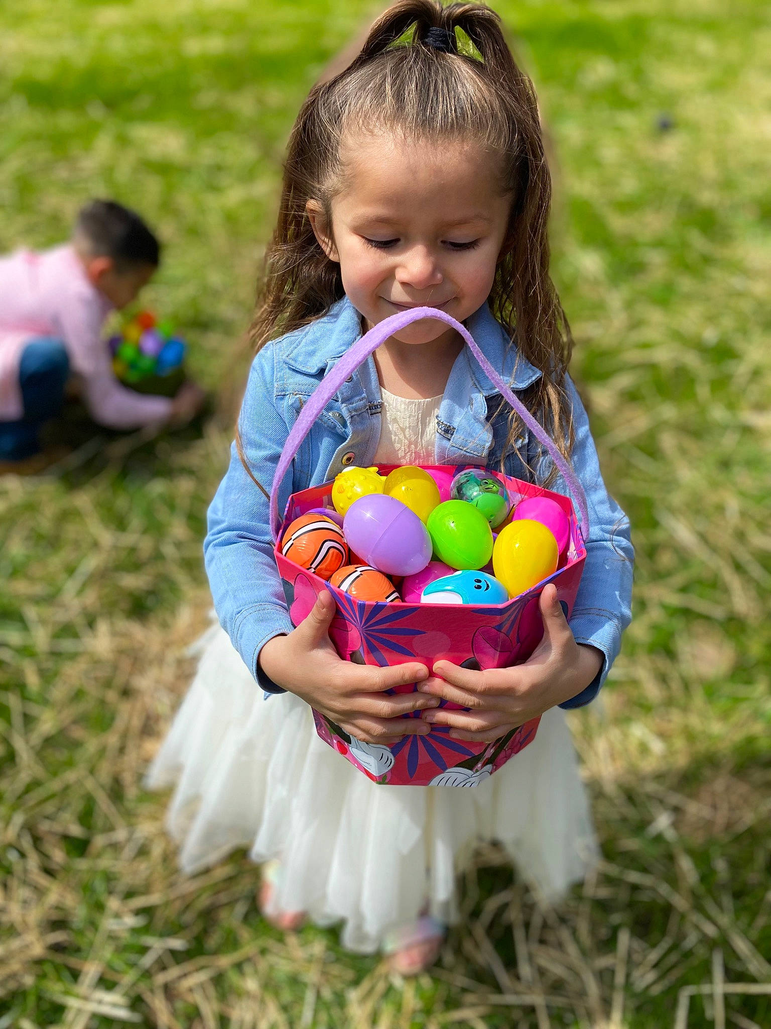 Laylani is registered to the contest to win money with this photo: baby, ball, basket, child, community, easter, easter_egg, event, fun, grass, happy, lawn, leisure, meadow, nature, people_in_nature, person, recreation, sports_equipment, toddler