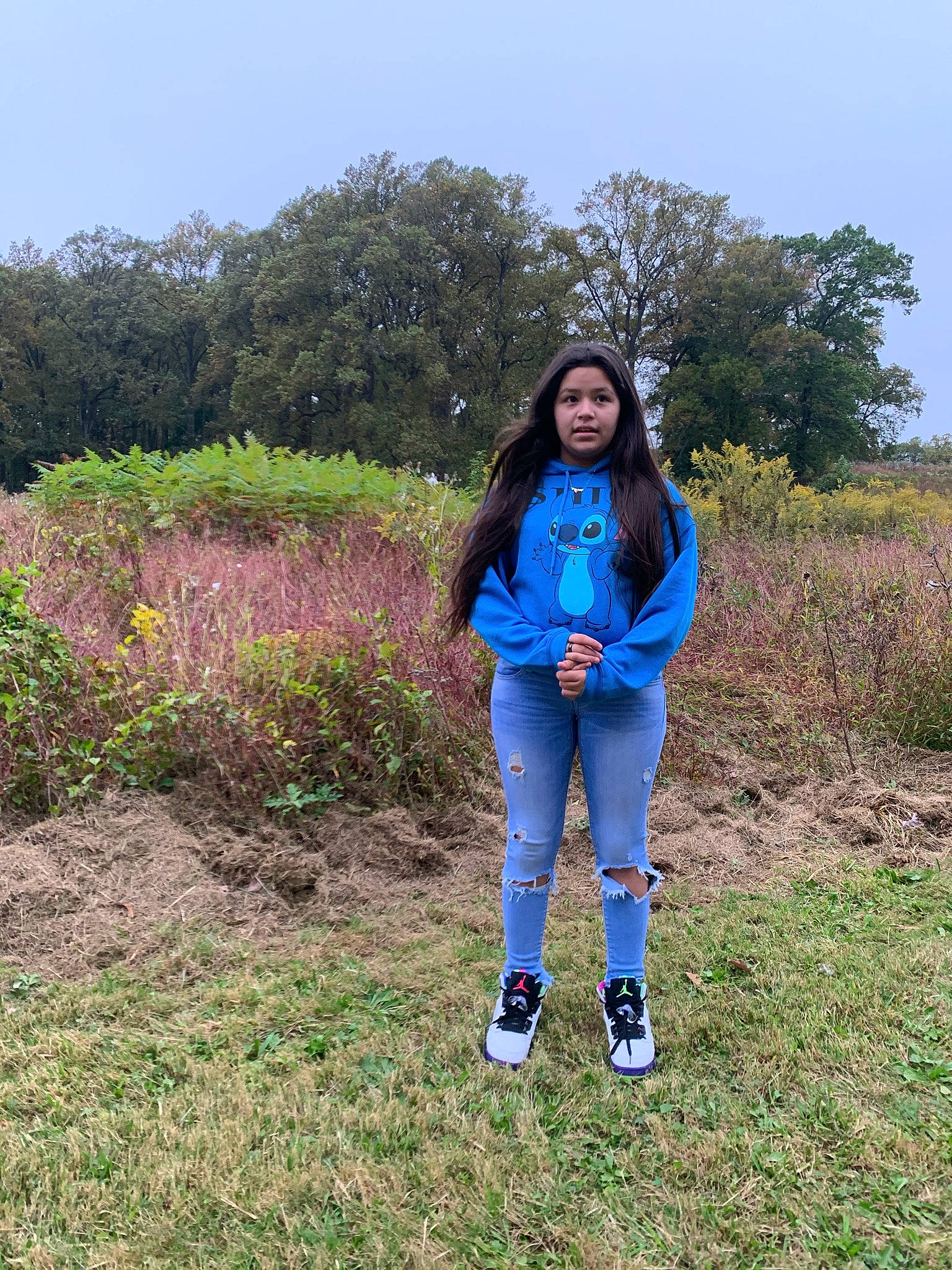 Mallalah joined the competition — help win amazing prizes! boot, denim, electric_blue, grass, grassland, happy, human_leg, knee, landscape, leisure, meadow, natural_landscape, outdoor_recreation, outerwear, people_in_nature, person, plant, prairie, recreation, sky