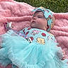 Willow joined the competition — help win amazing prizes! baby, infant, tutu, headband, blanket, grass, outdoor, cute, clothing, pastel_colors, pacifier, lying_down, child, cartoon_print, soft_texture, summer, skin, adorable, head, person