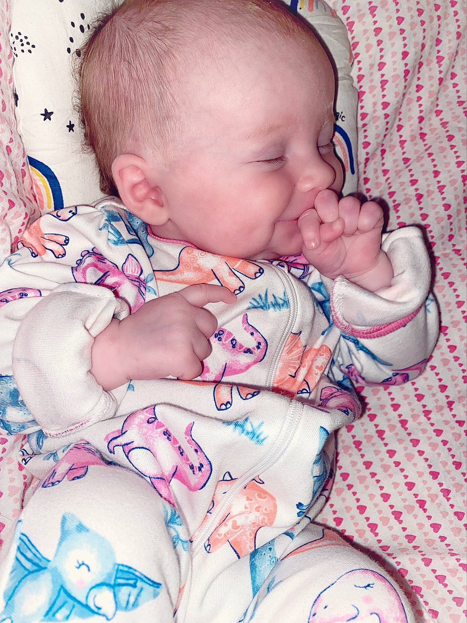 Hannah is registered to the contest to win money with this photo: arm, baby, baby_sleeping, baby_toddler_clothing, cheek, chin, comfort, ear, eye, face, finger, hand, head, lip, mouth, nose, person, pink, skin, textile