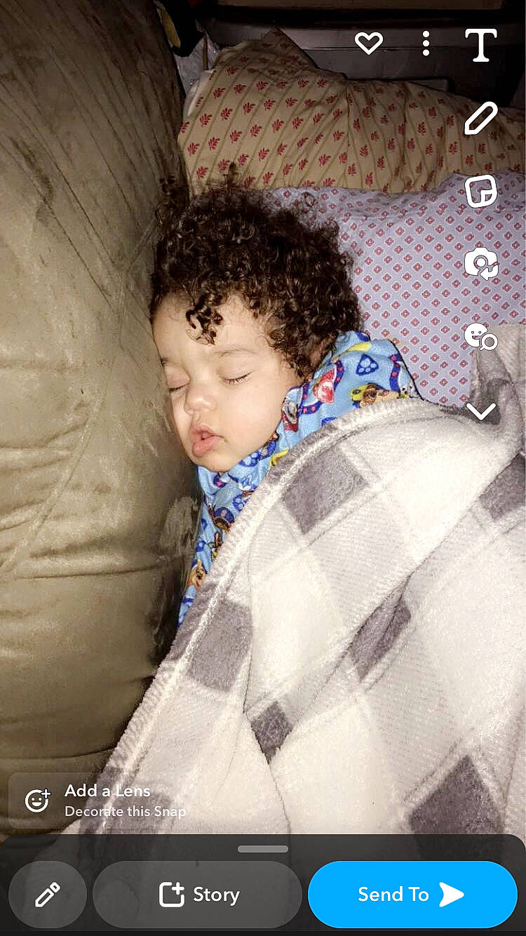 Jaysen is registered to the contest to win money with this photo: car_seat, child, comfort, couch, flash_photography, fun, happy, leisure, linens, pattern, person, photo_caption, portrait, portrait_photography, room, sitting, textile, toddler