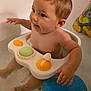 Mylee is registered to the contest to win money with this photo: baby, bath, bathtub, water, toy, child, face, skin, arm, hand, head, play, sitting, smile, happy, indoor, childcare, infant, bathroom, floating