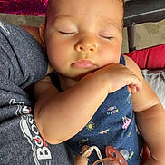 Mylee joined the competition — help win amazing prizes! baby, sleeping, pink_bow, pacifier, beads, navy_blue_outfit, child, person, arm, resting, cute, infant, closeup, peaceful, toddler, indoor, casual_clothing, head_accessory, holding, comfort