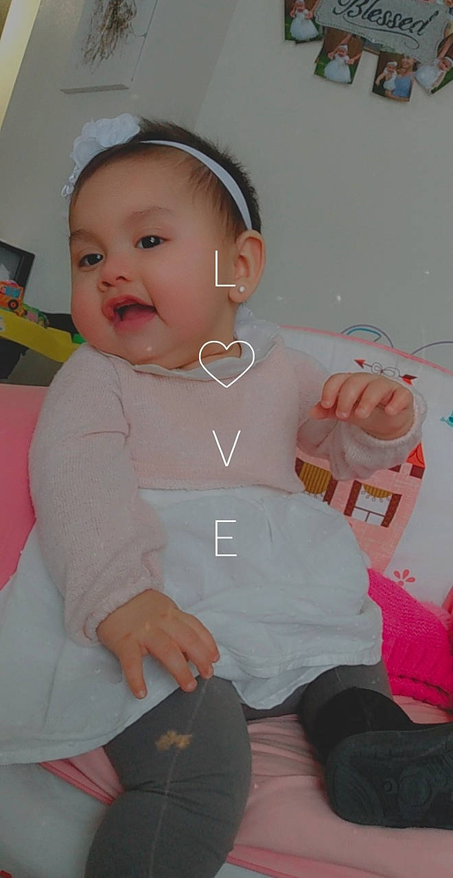 Aubrianna joined the competition — help win amazing prizes! baby, baby_grabbing_for_something, baby_products, baby_toddler_clothing, cheek, child, ear, finger, hair_accessory, headband, headpiece, joint, person, product, sock, toddler