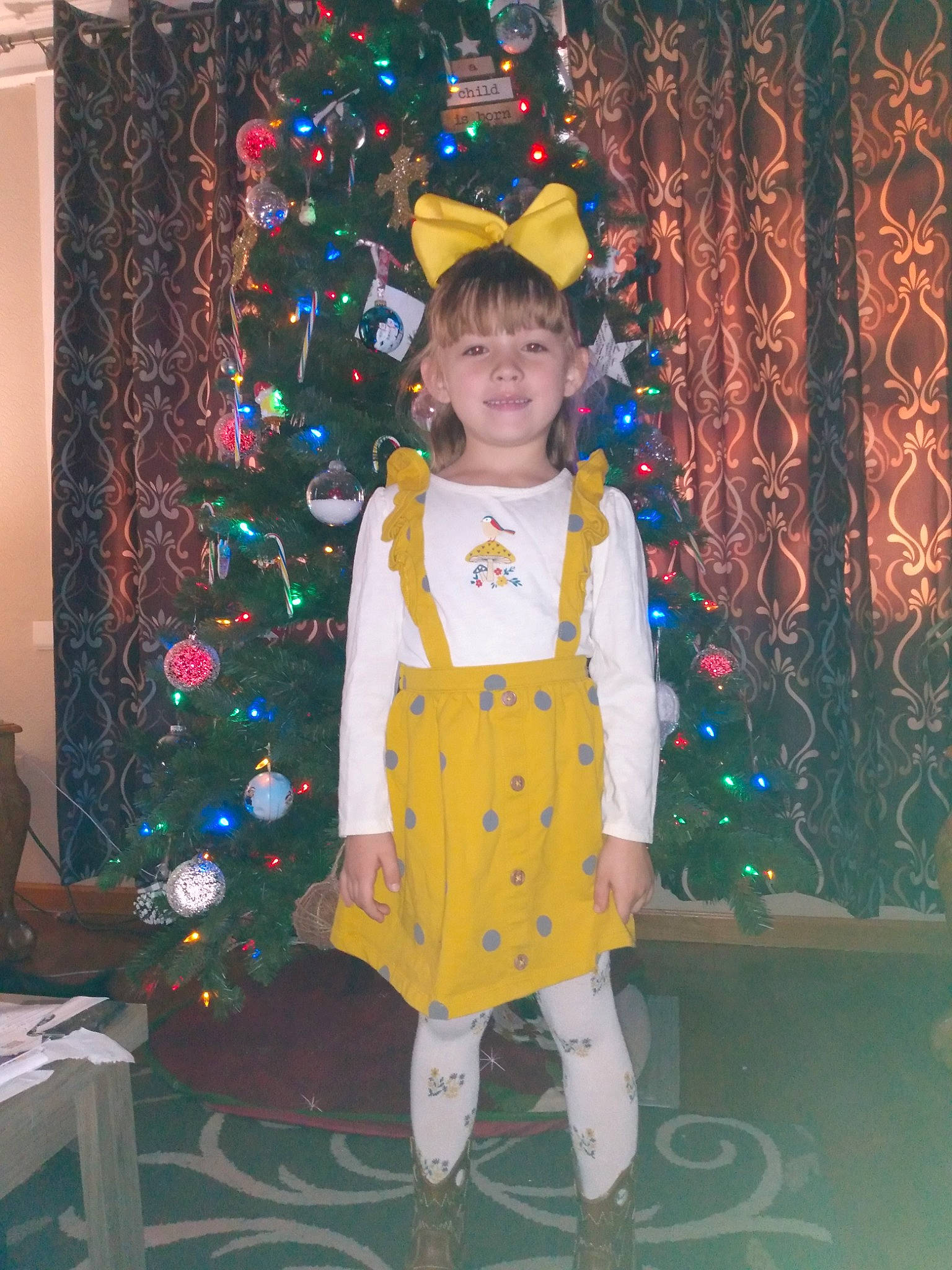 Fiona joined the competition — help win amazing prizes! child, christmas, costume, costume_hat, entertainment, event, fashion_design, fun, fur, hat, holiday, interior_design, joy, ornament, party_supply, pattern, person, room, sleeve, toddler