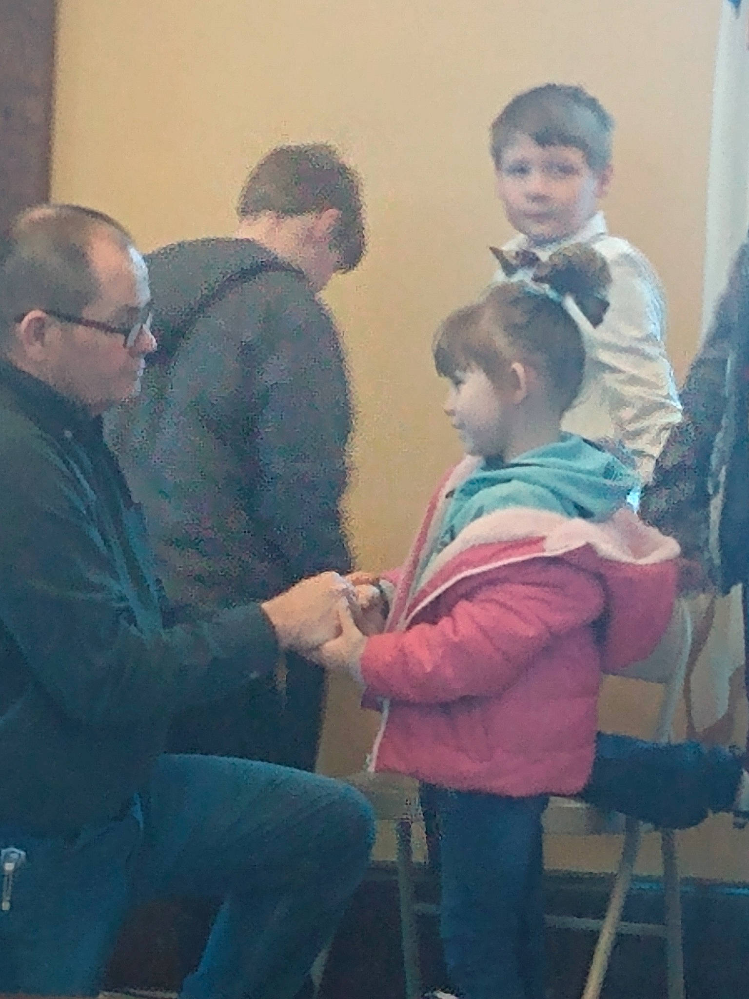 Fiona joined the competition — help win amazing prizes! bag, chair, child, comfort, conversation, event, fun, lap, luggage_and_bags, person, room, sharing, sitting, standing, visual_arts