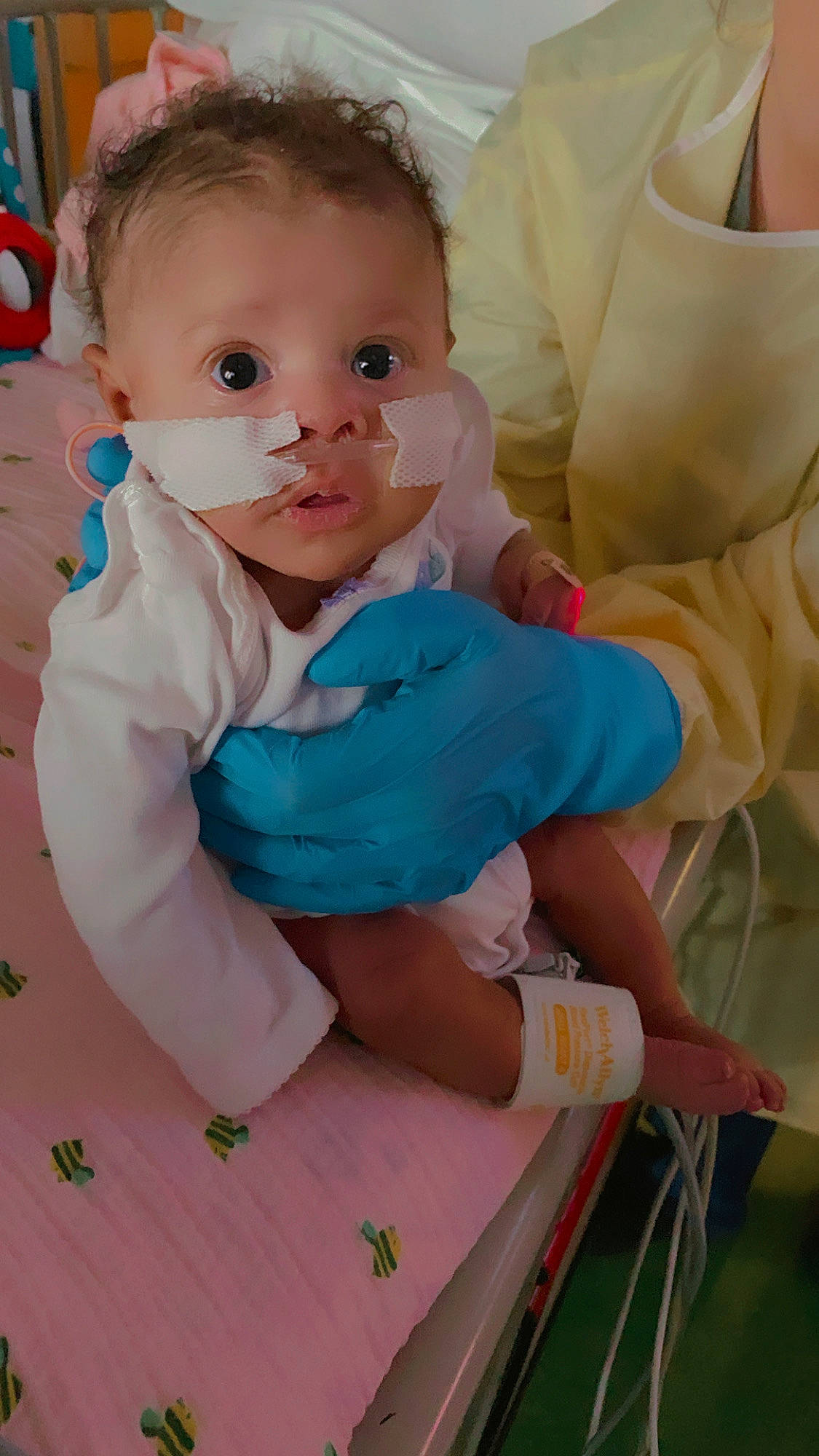 Kassidy joined the competition — help win amazing prizes! baby, baby_products, baby_toddler_clothing, chair, cheek, child, comfort, electric_blue, event, face, happy, head, linens, person, pink, sitting, skin, sock, textile, toddler