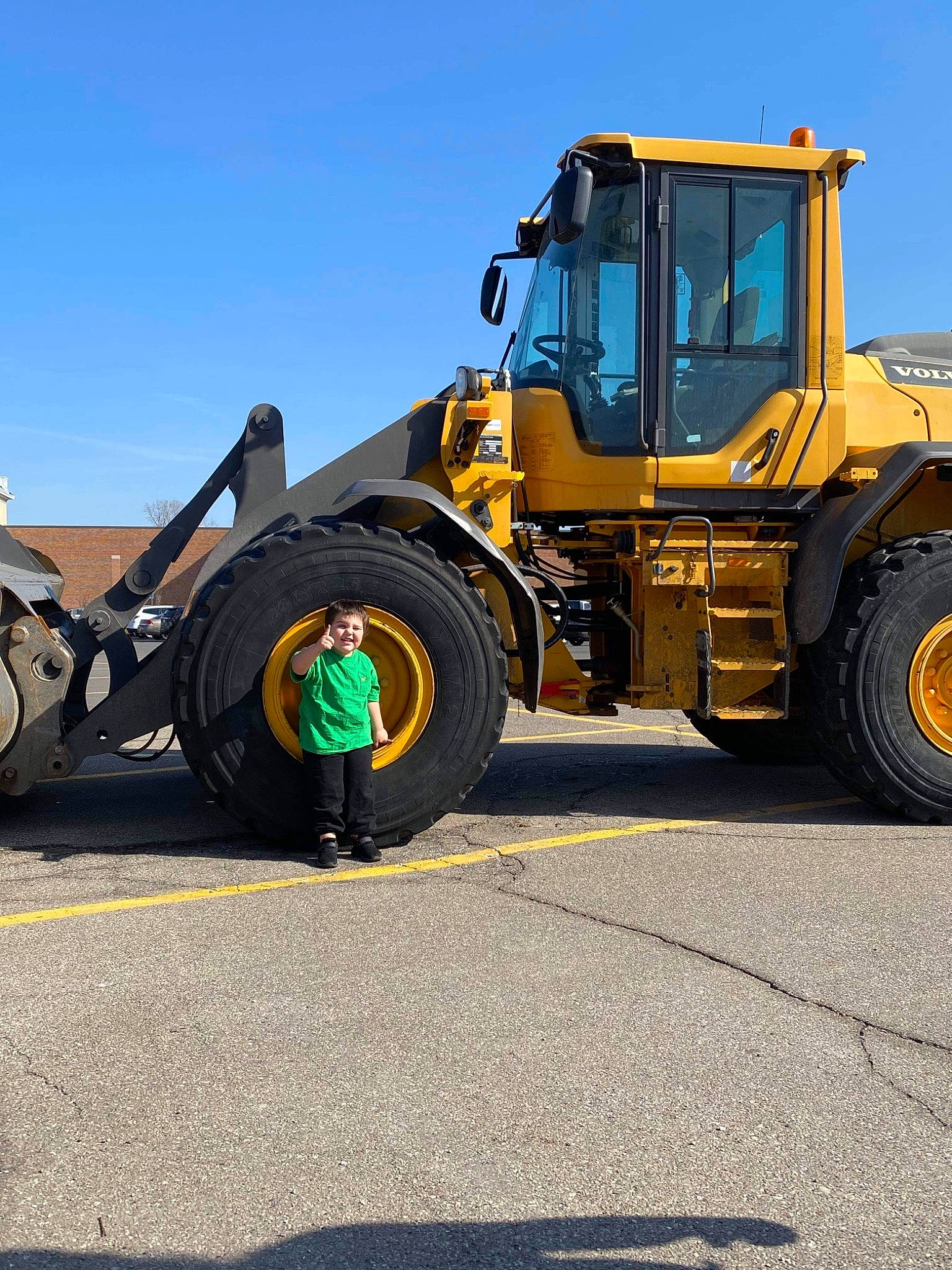 Lincoln joined the competition — help win amazing prizes! asphalt, auto_part, automotive_design, automotive_exterior, automotive_tire, automotive_wheel_system, fender, gas, joy, machine, motor_vehicle, person, rim, road_surface, rolling, sky, tar, tire, tire_care, tread