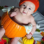 Noah joined the competition — help win amazing prizes! autumn_leaves, baby, blanket, child, cozy, cute, fall_decor, festive, hat, indoors, infant, knitted, orange, pinecone, pumpkin, seasonal, sitting, smiling, white, yellow