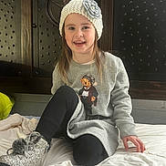 Aurora joined the competition — help win amazing prizes! adult, baby, cap, clothing, face, female, footwear, furniture, happy, hat, head, pants, person, photography, portrait, shoe, sitting, smile, sneaker, woman