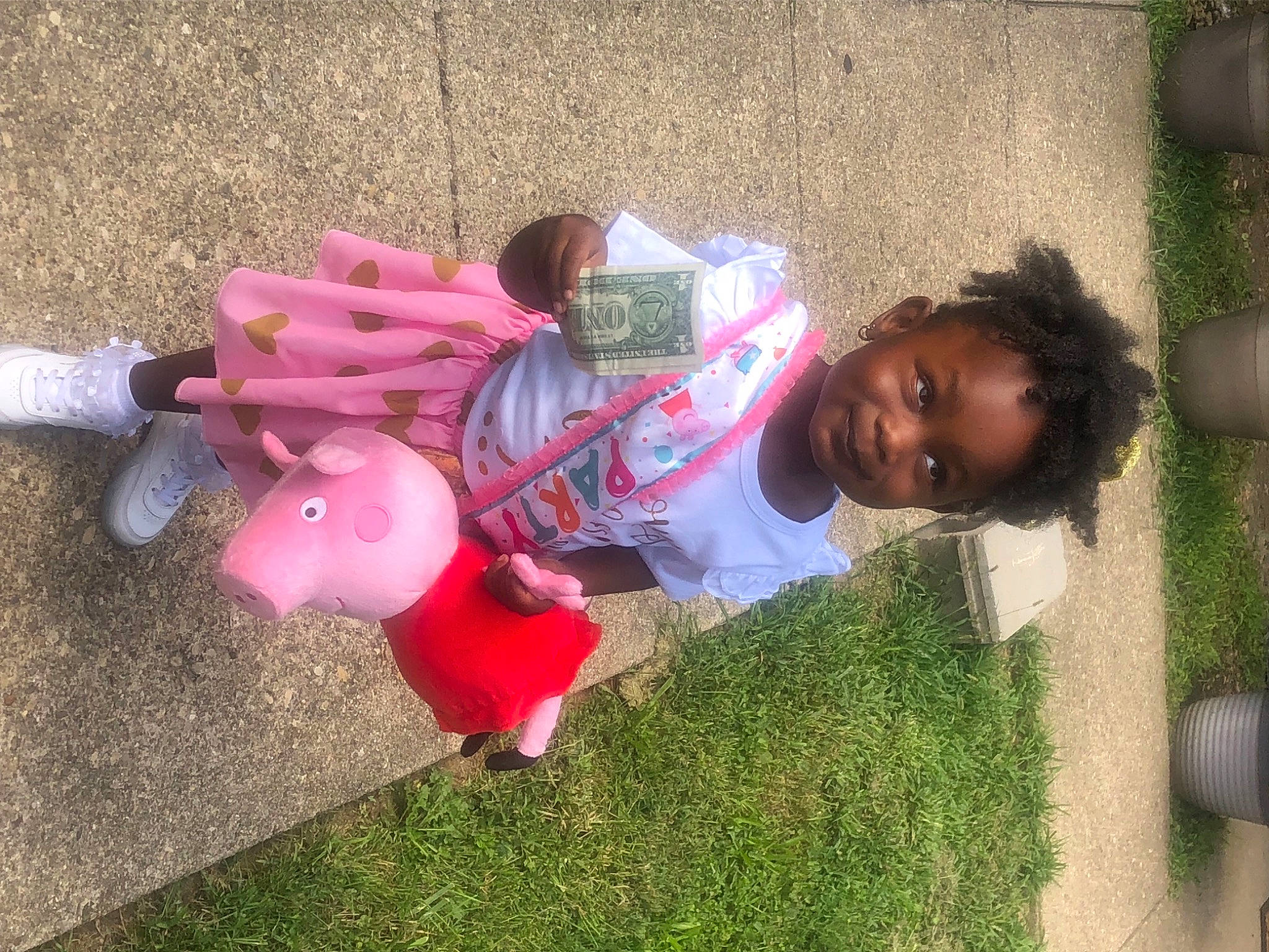 Ambrya is registered to the contest to win money with this photo: carmine, child, fun, grass, happy, human_leg, leisure, magenta, people_in_nature, person, play, recreation, shadow, sitting, smile, toddler, toy