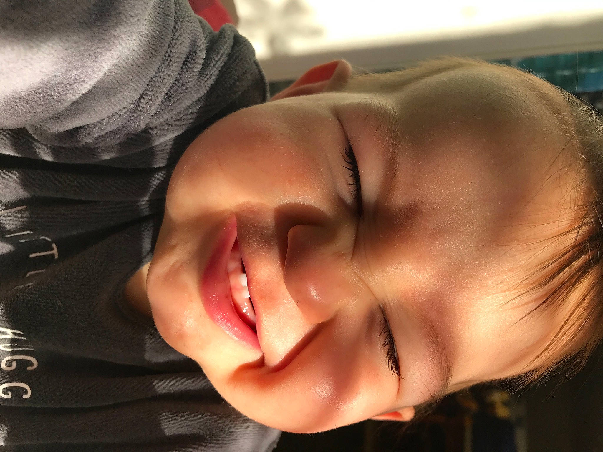 Lucien participe au concours pour gagner de l'argent avec cette photo : baby, cheek, cool, ear, eyebrow, eyelash, flash_photography, forehead, gesture, happy, human_body, jaw, lip, mouth, neck, nose, plant, skin, smile, toddler