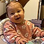 Valentina a rejoint le concours — aidez-le/la à gagner de superbes lots ! baby, child, smiling, pigtails, pink_sweater, flowers, toy, button, highchair, indoor, happy, face, hands, wooden_stairs, home, decorations, playtime, cute, infant, portrait