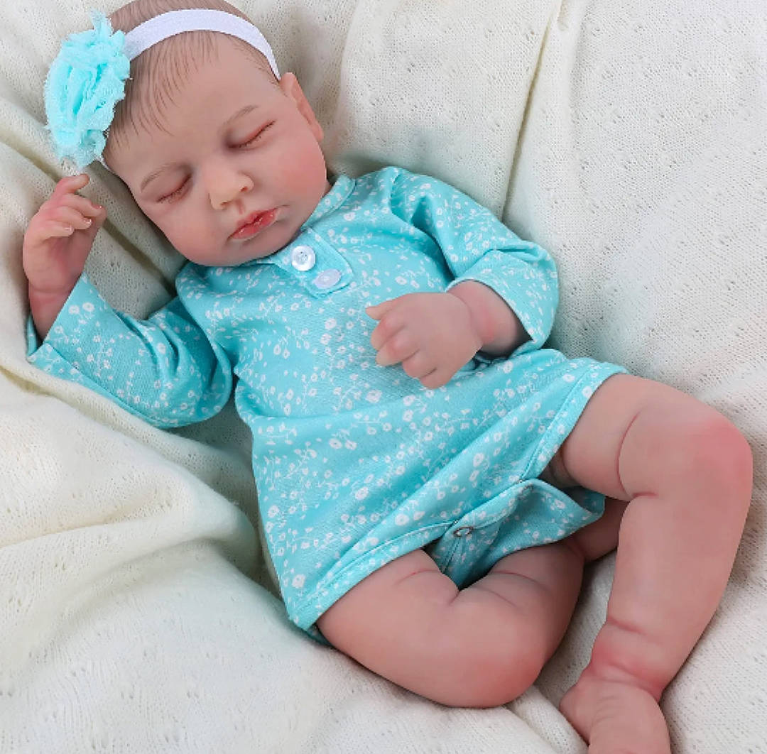 Olivia joined the competition — help win amazing prizes! arm, azure, baby, baby_sleeping, baby_toddler_clothing, cheek, child, comfort, eye, foot, hat, headwear, human_body, leg, linens, person, pink, sitting, skin, sleeve