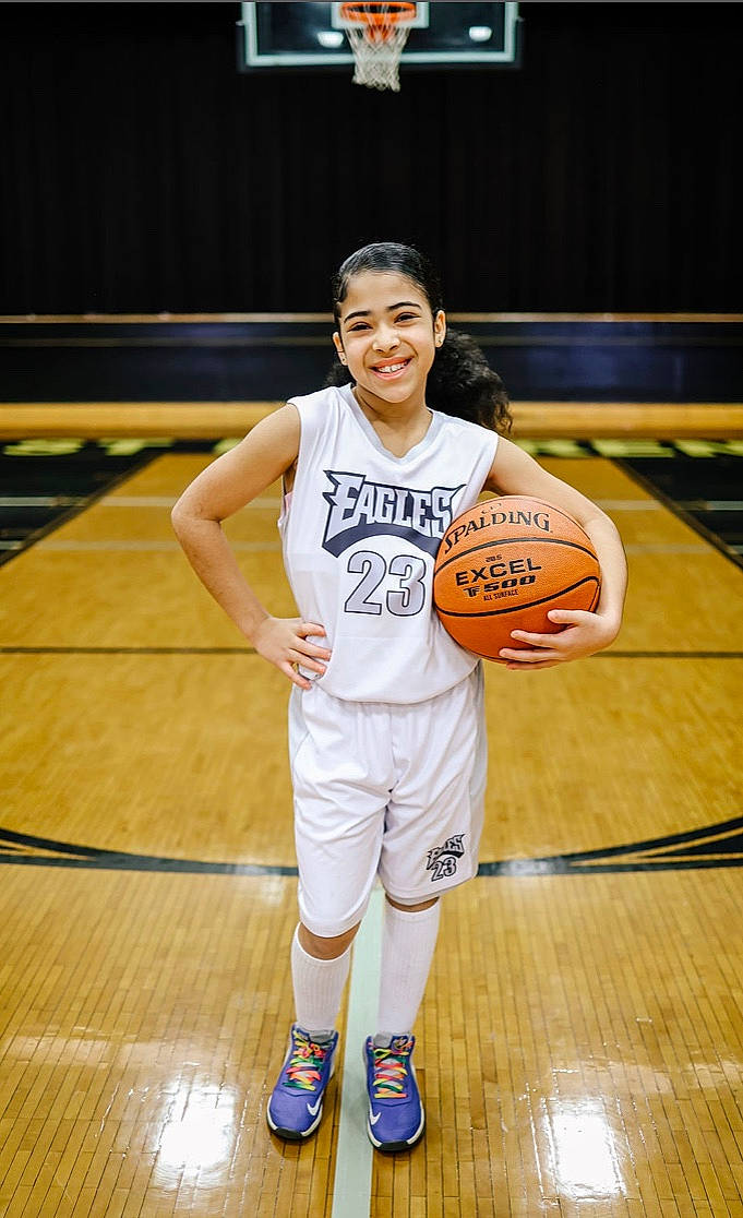 Audrey is registered to the contest to win money with this photo: ball, ball_game, basketball, basketball_court, basketball_moves, basketball_player, joint, joy, knee, person, player, shorts, smile, sports, sports_equipment, sports_uniform, sportswear, team_sport, thigh, womens_basketball