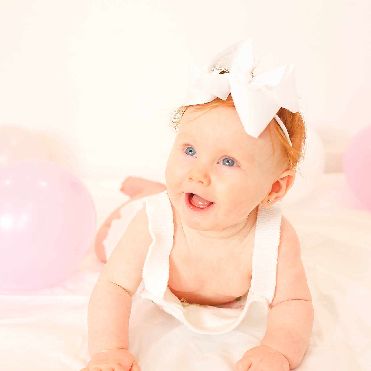 Emberly joined the competition — help win amazing prizes! accessories, baby, balloon, bodypart, clothing, crawling, dress, face, finger, formalwear, hand, happy, hat, head, headband, newborn, person, photography, portrait, smile