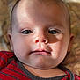 Isaiah is registered to the contest to win money with this photo: baby, infant, face, portrait, closeup, child, red_clothing, striped_shirt, skin, eyes, mouth, soft_lighting, indoors, cute, young, person, expression, head, cheeks, newborn
