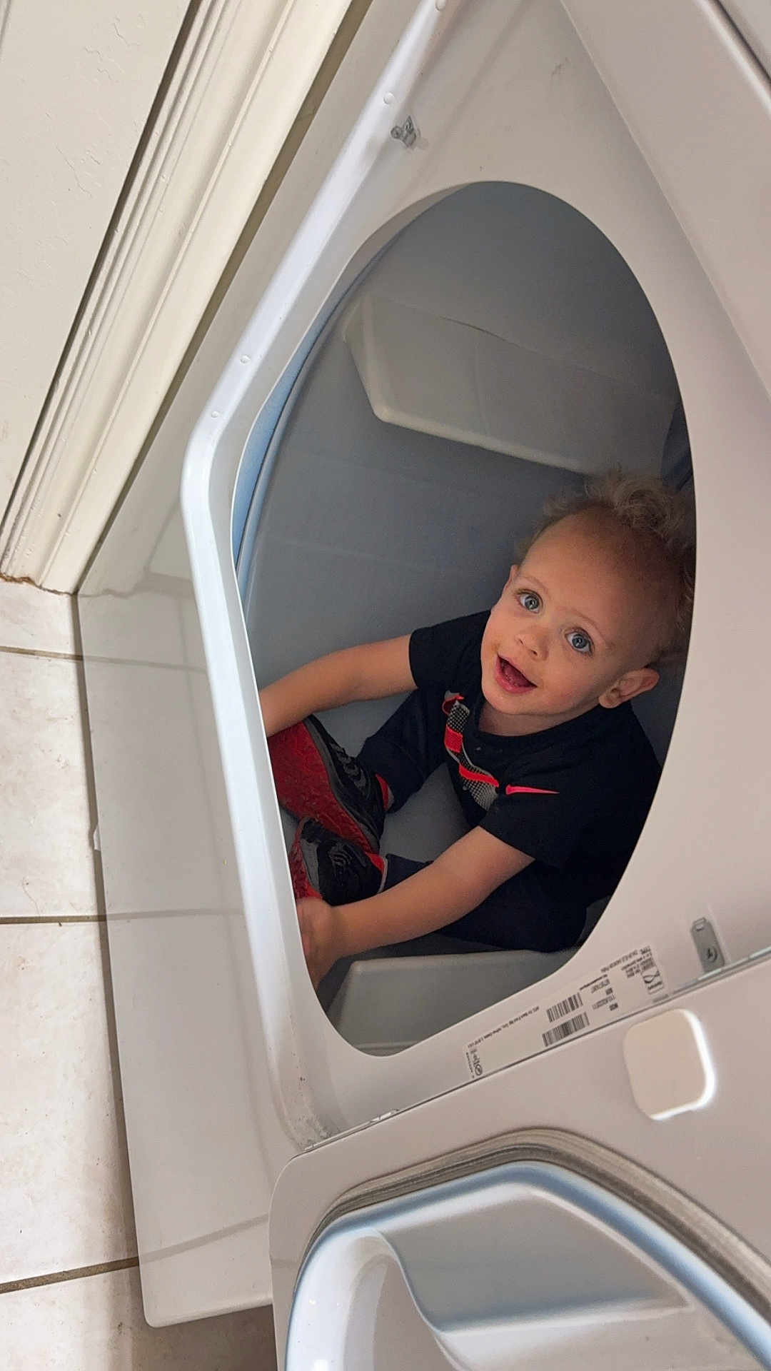 Jayce Appleby joined the competition — help win amazing prizes! appliance, baby, bodypart, clothing, device, electricaldevice, face, finger, footwear, hand, head, laundry, person, photography, portrait, shoe, sitting, washer