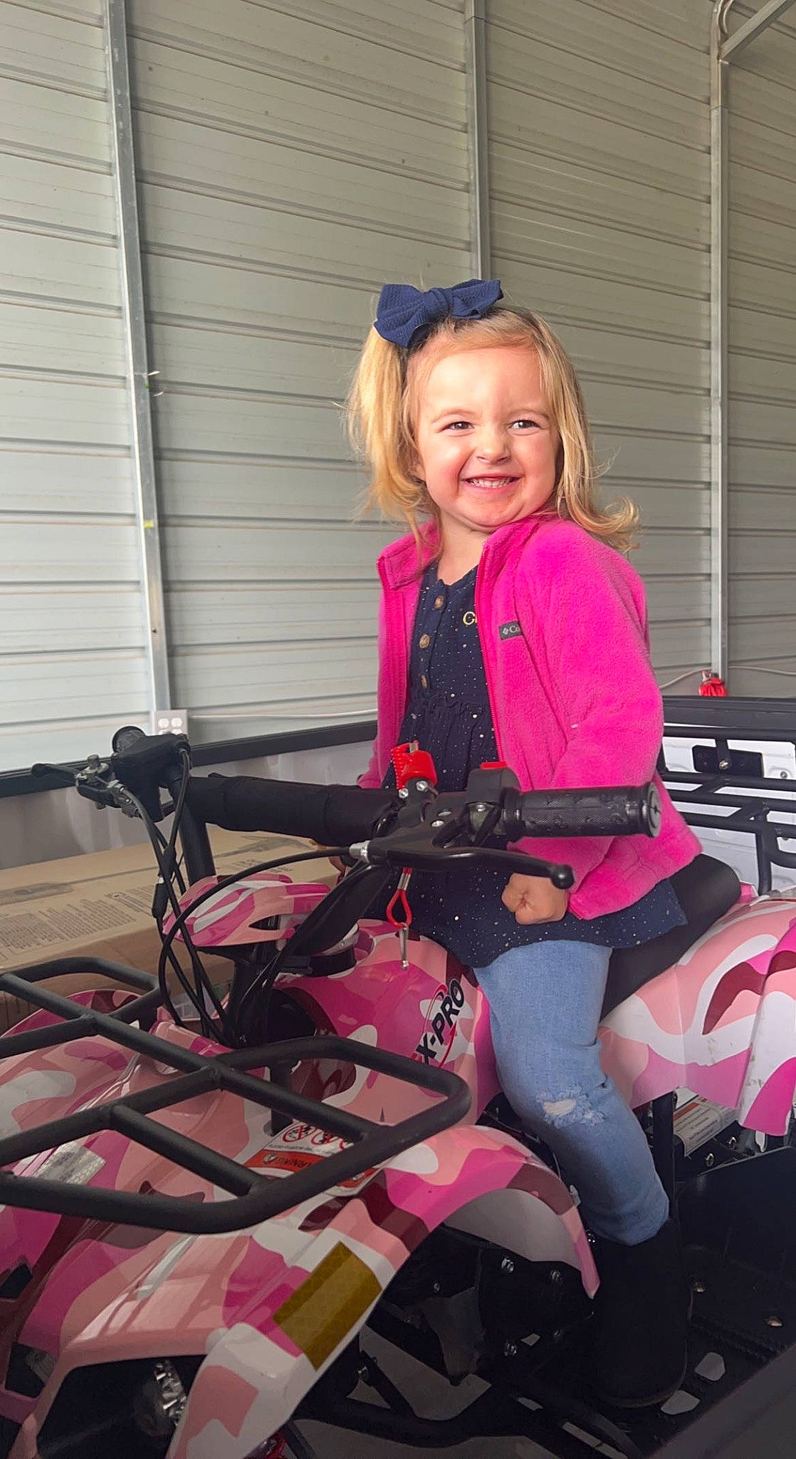 Kinley joined the competition — help win amazing prizes! baby_carriage, baby_products, bag, bicycle_frame, bicycle_handlebar, bicycle_tire, bicycles_equipment_and_supplies, fun, joy, lap, leisure, luggage_and_bags, magenta, motor_vehicle, person, pink, recreation, sitting, sleeve, smile