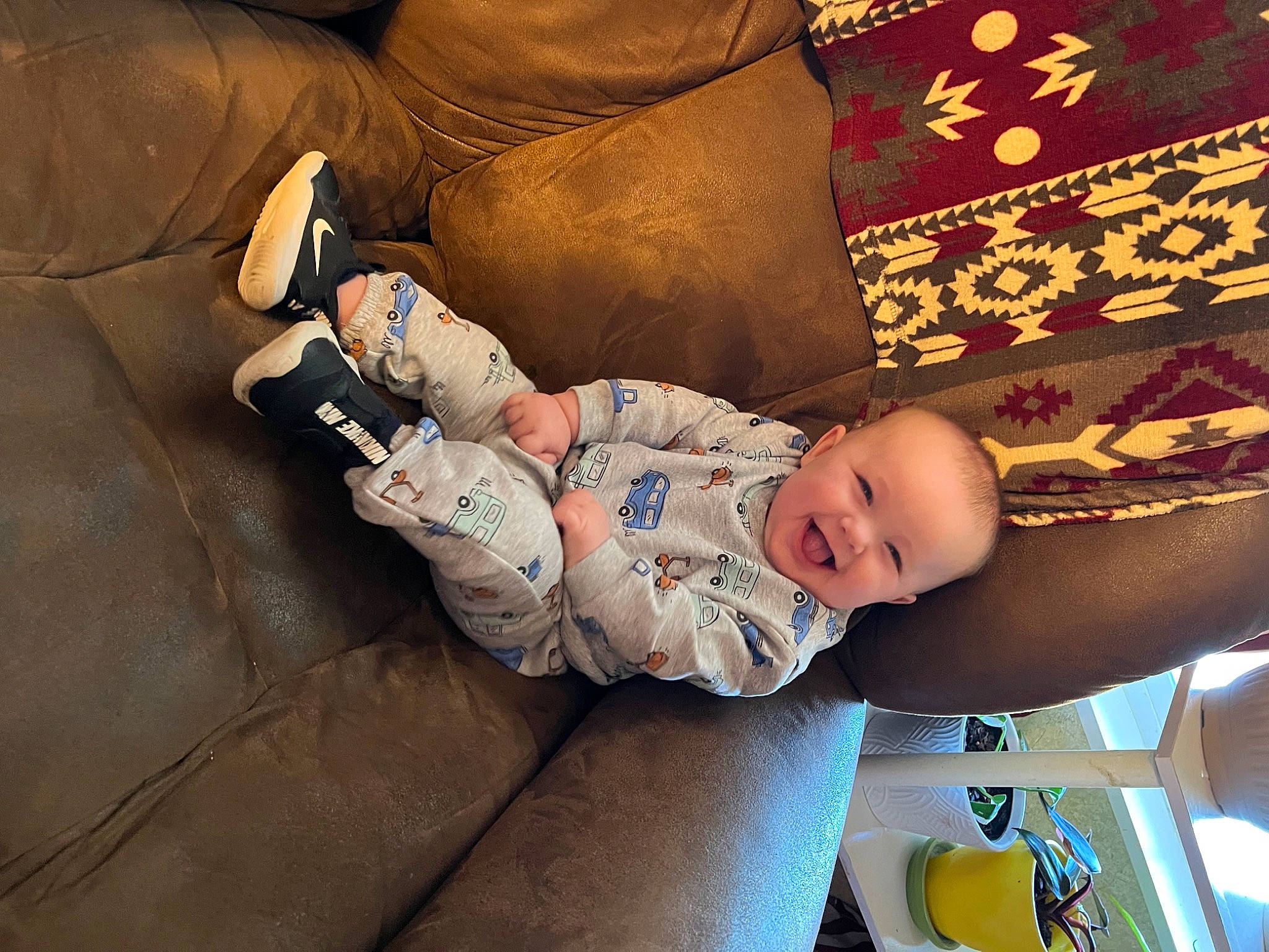 Liam is registered to the contest to win money with this photo: baby, baby_products, baby_sleeping, baby_toddler_clothing, bedtime, cheek, child, comfort, couch, head, human_body, joy, lap, linens, nap, pattern, person, room, sitting, smile